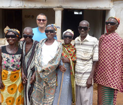 Dr. Albert Alley, director of the World Blindness Outreach, and six villagers who received free cataract surgery during the mission.